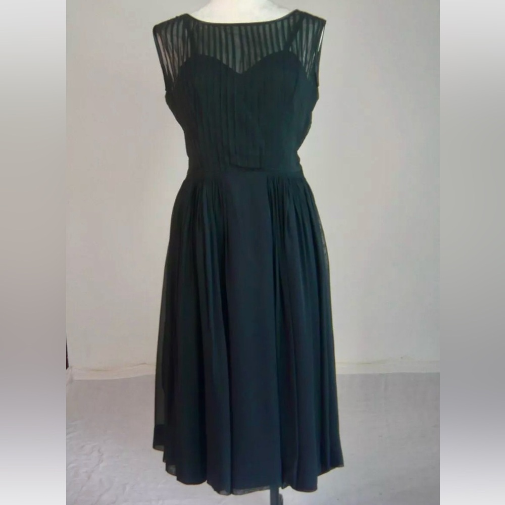 Vintage little black dress, size small.